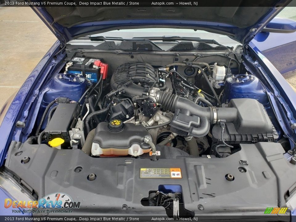 2013 Ford Mustang V6 Premium Coupe Deep Impact Blue Metallic / Stone Photo #20
