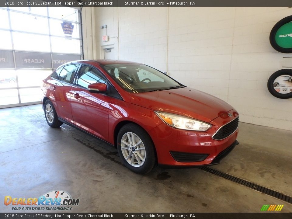 2018 Ford Focus SE Sedan Hot Pepper Red / Charcoal Black Photo #1