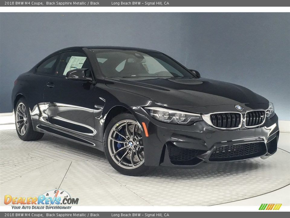 Front 3/4 View of 2018 BMW M4 Coupe Photo #12