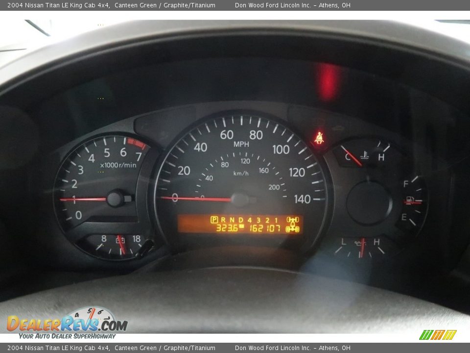 2004 Nissan Titan LE King Cab 4x4 Canteen Green / Graphite/Titanium Photo #15