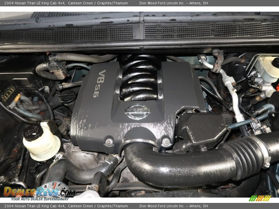 2004 Nissan Titan LE King Cab 4x4 Canteen Green / Graphite/Titanium Photo #21