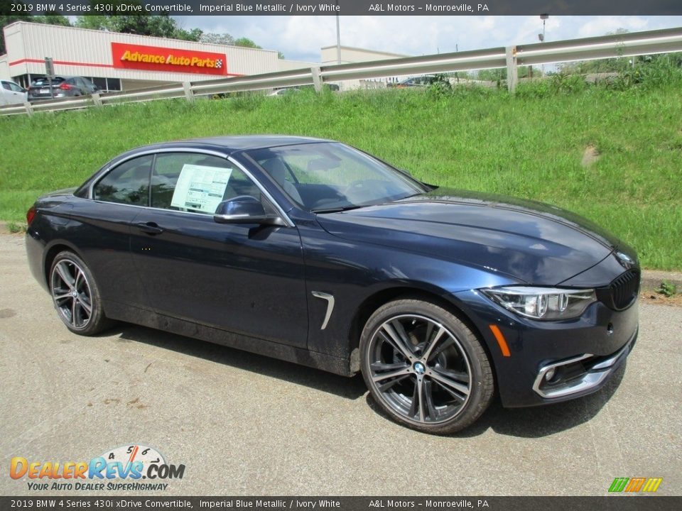 Front 3/4 View of 2019 BMW 4 Series 430i xDrive Convertible Photo #1