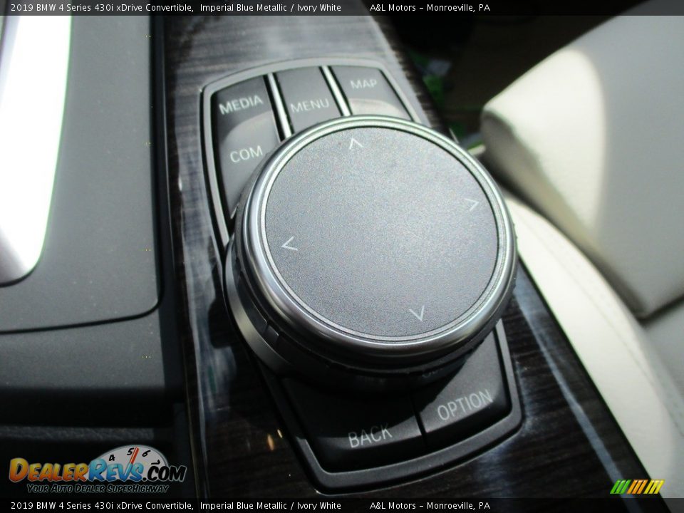 Controls of 2019 BMW 4 Series 430i xDrive Convertible Photo #17