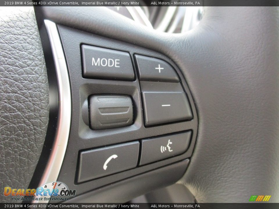 Controls of 2019 BMW 4 Series 430i xDrive Convertible Photo #19