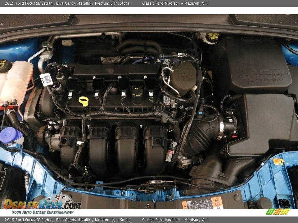 2015 Ford Focus SE Sedan Blue Candy Metallic / Medium Light Stone Photo #16