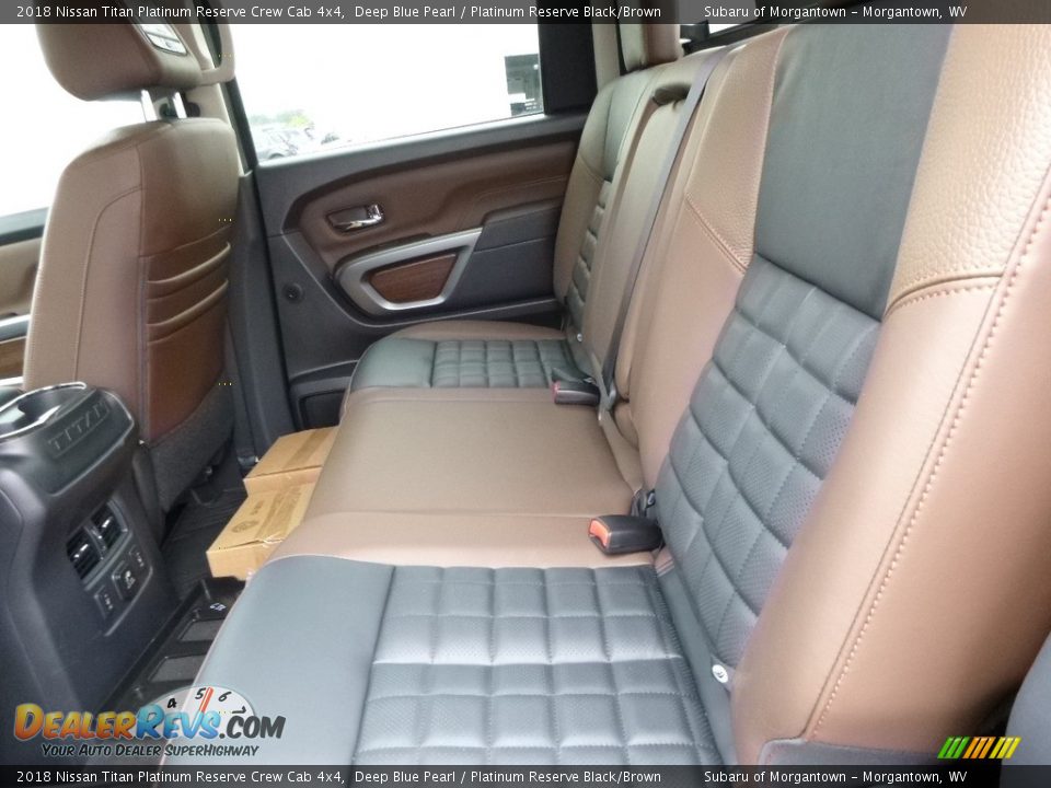 Rear Seat of 2018 Nissan Titan Platinum Reserve Crew Cab 4x4 Photo #13