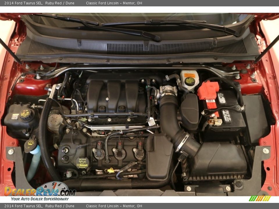 2014 Ford Taurus SEL Ruby Red / Dune Photo #28