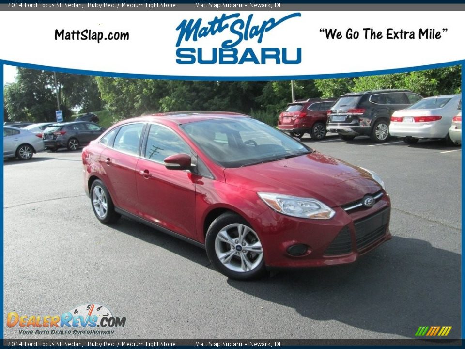 2014 Ford Focus SE Sedan Ruby Red / Medium Light Stone Photo #1