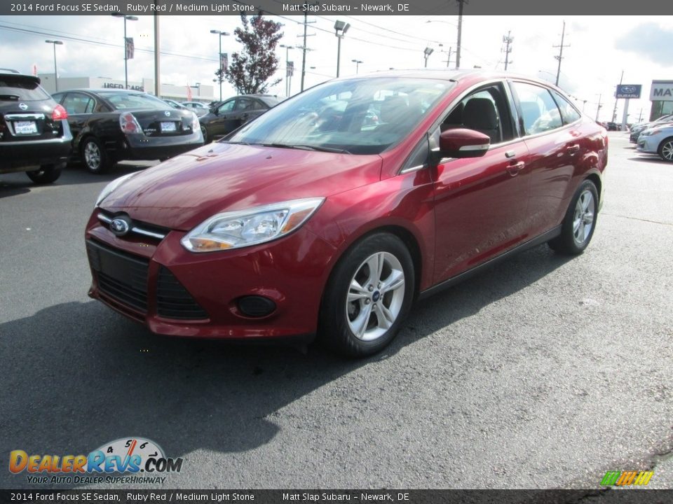 2014 Ford Focus SE Sedan Ruby Red / Medium Light Stone Photo #2