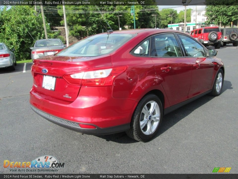 2014 Ford Focus SE Sedan Ruby Red / Medium Light Stone Photo #6