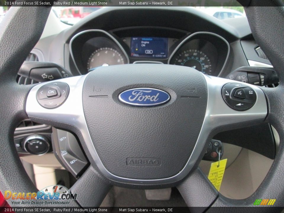 2014 Ford Focus SE Sedan Ruby Red / Medium Light Stone Photo #11