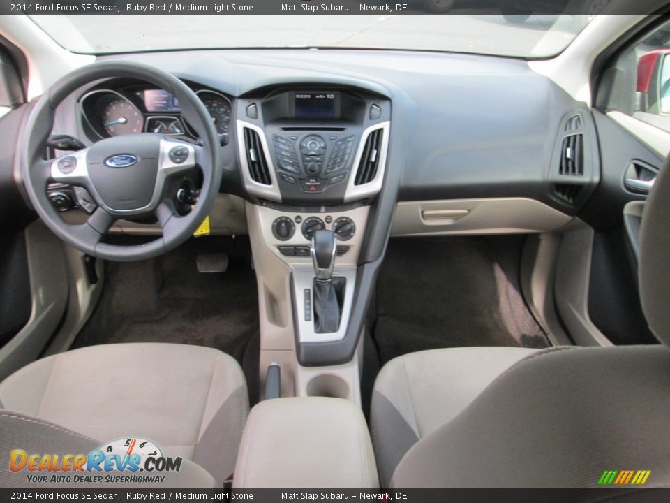 2014 Ford Focus SE Sedan Ruby Red / Medium Light Stone Photo #25