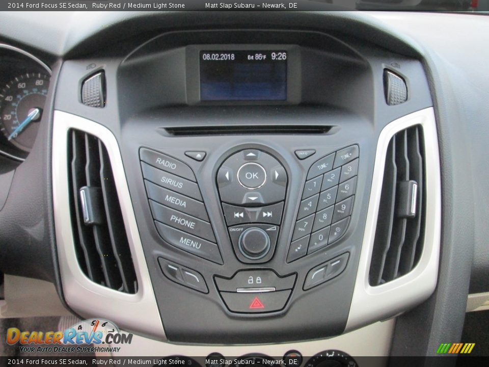 2014 Ford Focus SE Sedan Ruby Red / Medium Light Stone Photo #26
