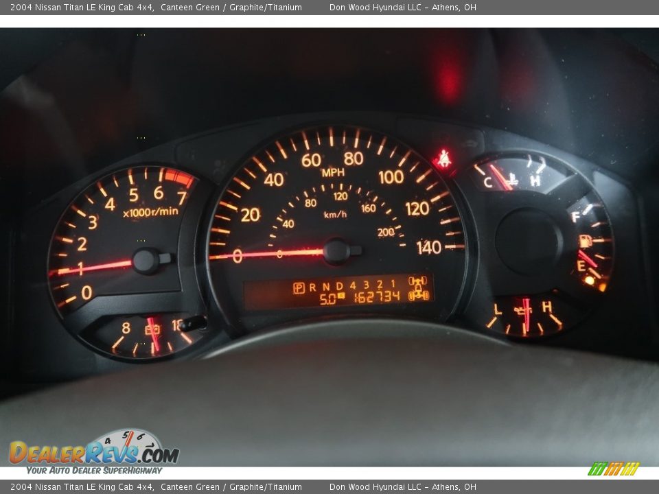 2004 Nissan Titan LE King Cab 4x4 Canteen Green / Graphite/Titanium Photo #16