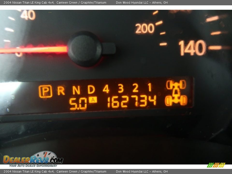 2004 Nissan Titan LE King Cab 4x4 Canteen Green / Graphite/Titanium Photo #17