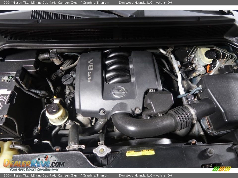 2004 Nissan Titan LE King Cab 4x4 Canteen Green / Graphite/Titanium Photo #26