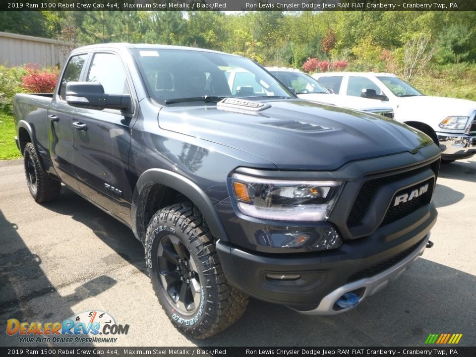 Front 3/4 View of 2019 Ram 1500 Rebel Crew Cab 4x4 Photo #7