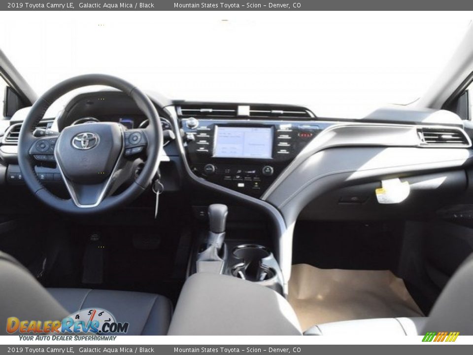 Dashboard of 2019 Toyota Camry LE Photo #8