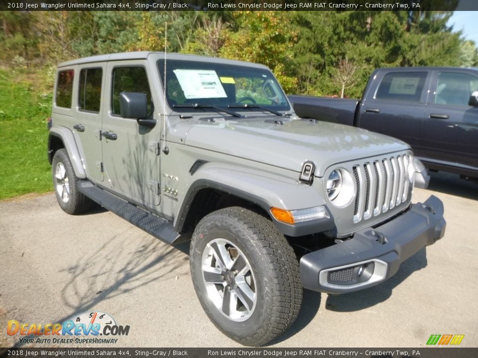 Front 3/4 View of 2018 Jeep Wrangler Unlimited Sahara 4x4 Photo #7
