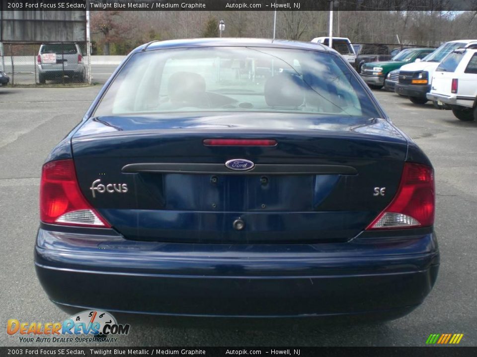 2003 Ford Focus SE Sedan Twilight Blue Metallic / Medium Graphite Photo #4