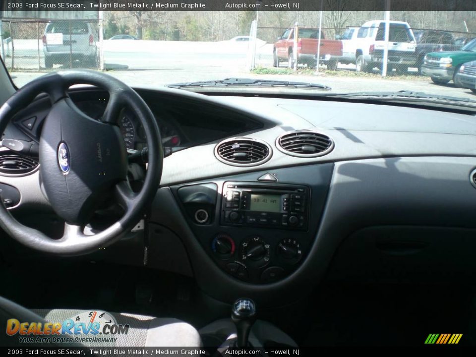 2003 Ford Focus SE Sedan Twilight Blue Metallic / Medium Graphite Photo #12