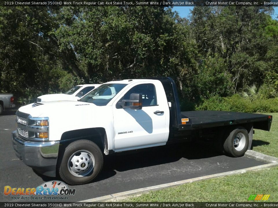 Front 3/4 View of 2019 Chevrolet Silverado 3500HD Work Truck Regular Cab 4x4 Stake Truck Photo #1