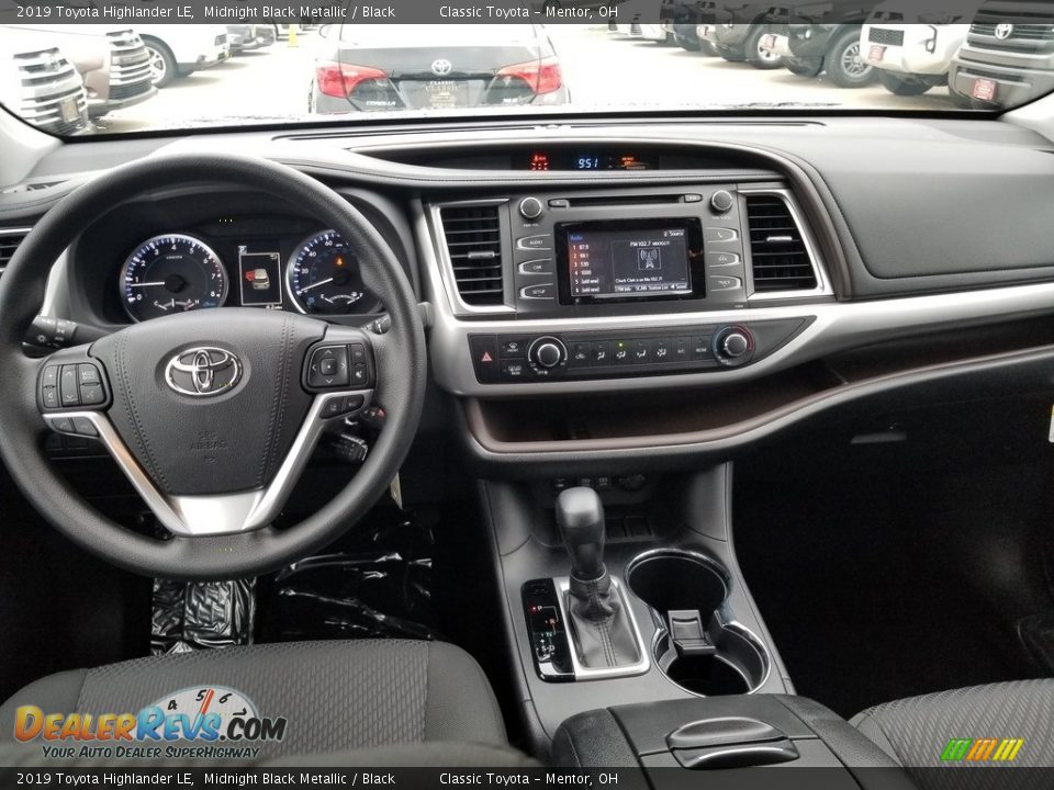 Dashboard of 2019 Toyota Highlander LE Photo #5