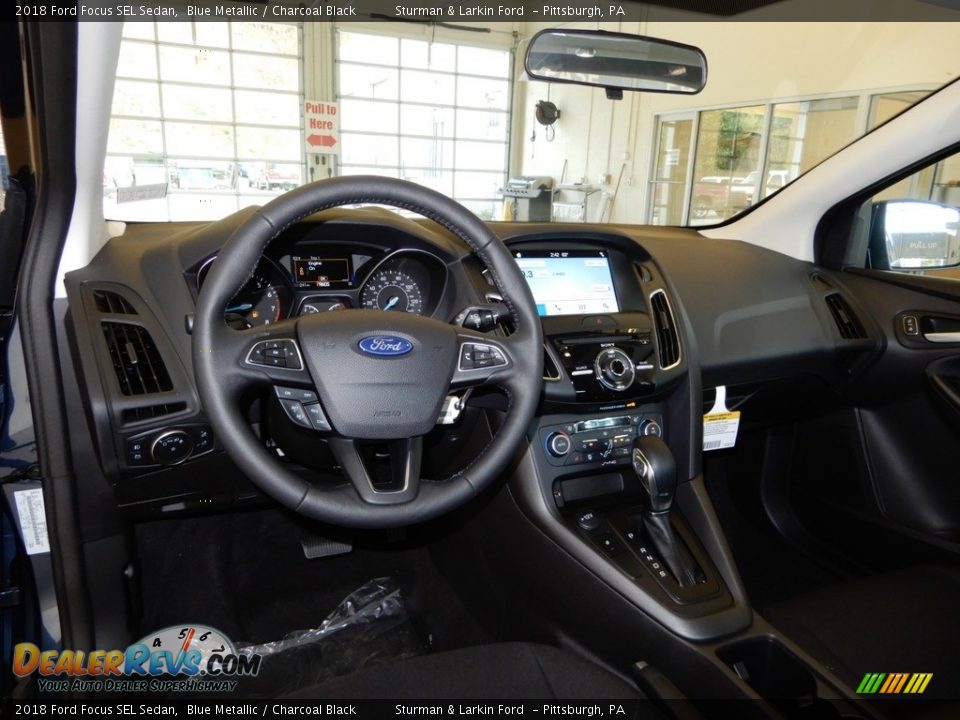 2018 Ford Focus SEL Sedan Blue Metallic / Charcoal Black Photo #9