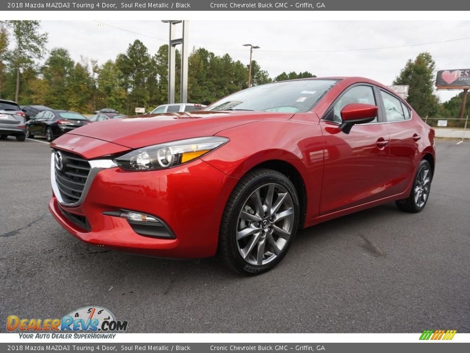 Front 3/4 View of 2018 Mazda MAZDA3 Touring 4 Door Photo #3