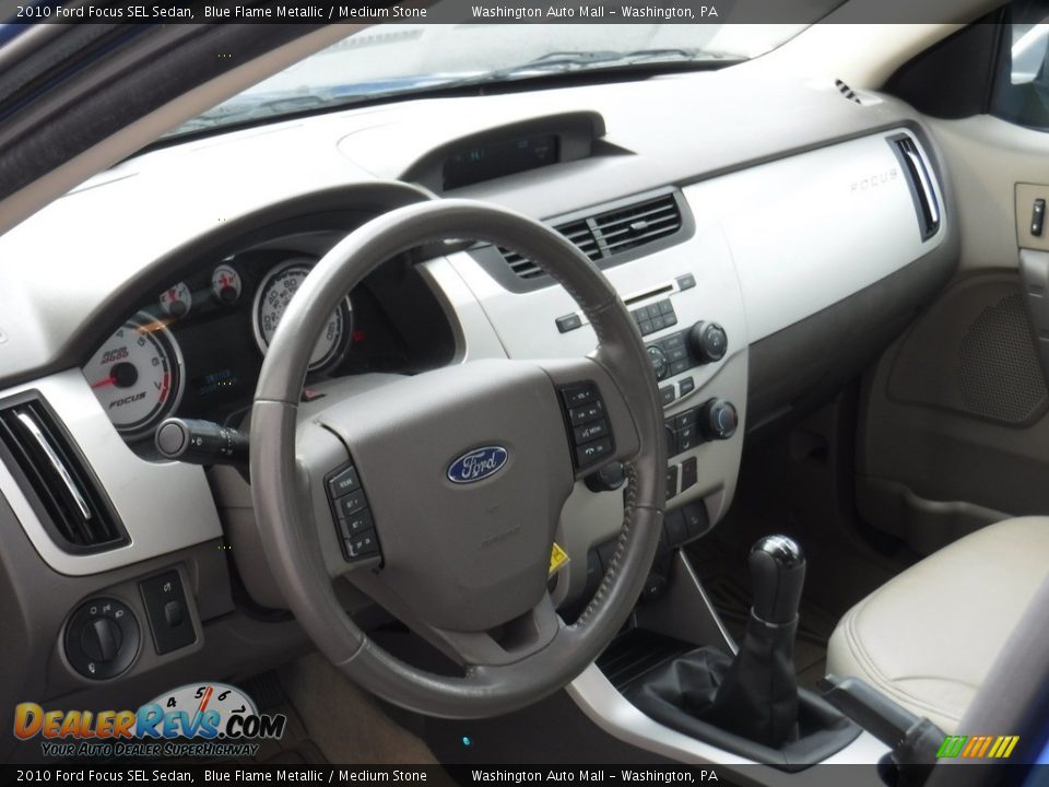 2010 Ford Focus SEL Sedan Blue Flame Metallic / Medium Stone Photo #12