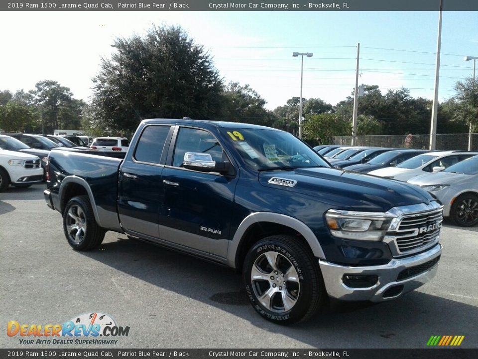 Front 3/4 View of 2019 Ram 1500 Laramie Quad Cab Photo #7