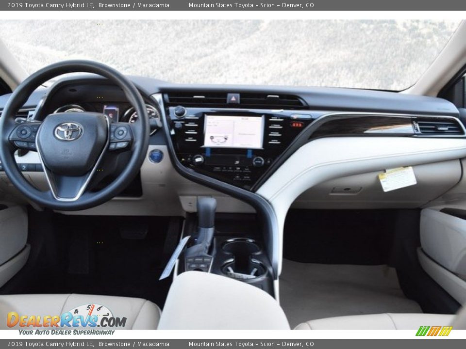 Dashboard of 2019 Toyota Camry Hybrid LE Photo #8