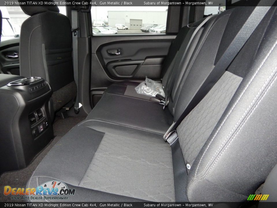 Rear Seat of 2019 Nissan TITAN XD Midnight Edition Crew Cab 4x4 Photo #11