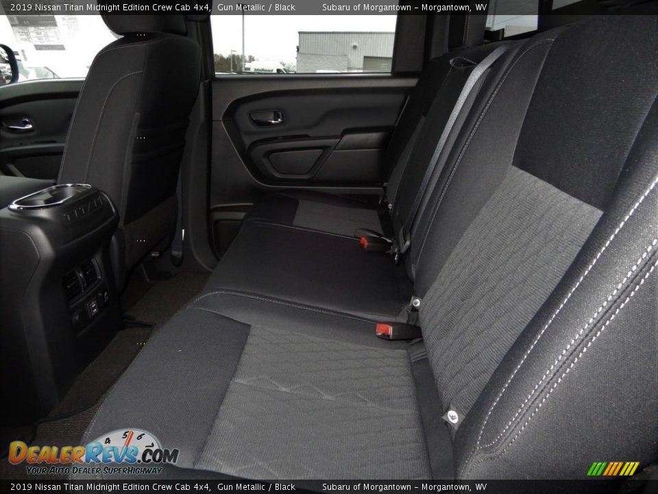 Rear Seat of 2019 Nissan Titan Midnight Edition Crew Cab 4x4 Photo #11