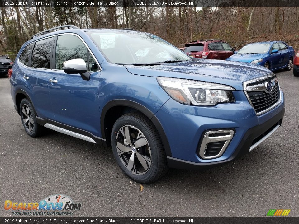 Front 3/4 View of 2019 Subaru Forester 2.5i Touring Photo #1