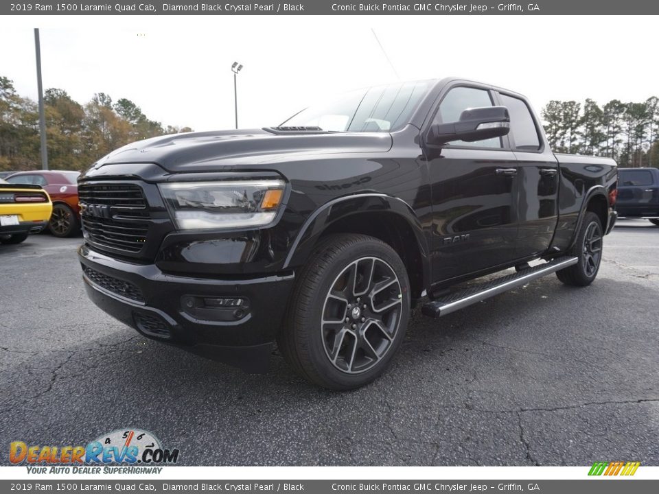 Front 3/4 View of 2019 Ram 1500 Laramie Quad Cab Photo #3