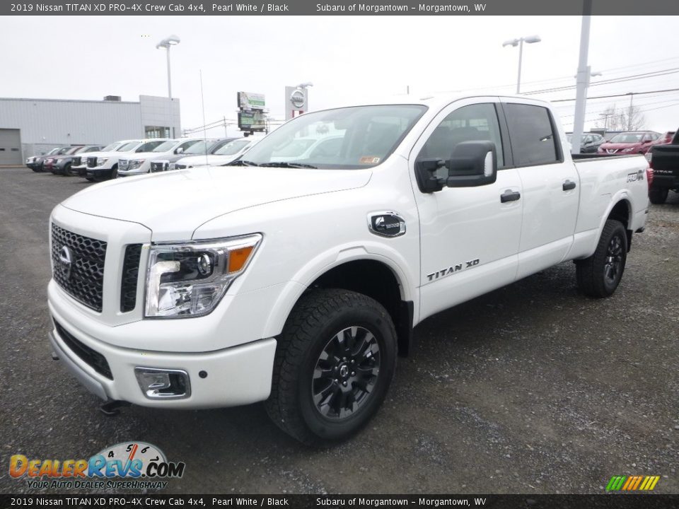 Front 3/4 View of 2019 Nissan TITAN XD PRO-4X Crew Cab 4x4 Photo #10