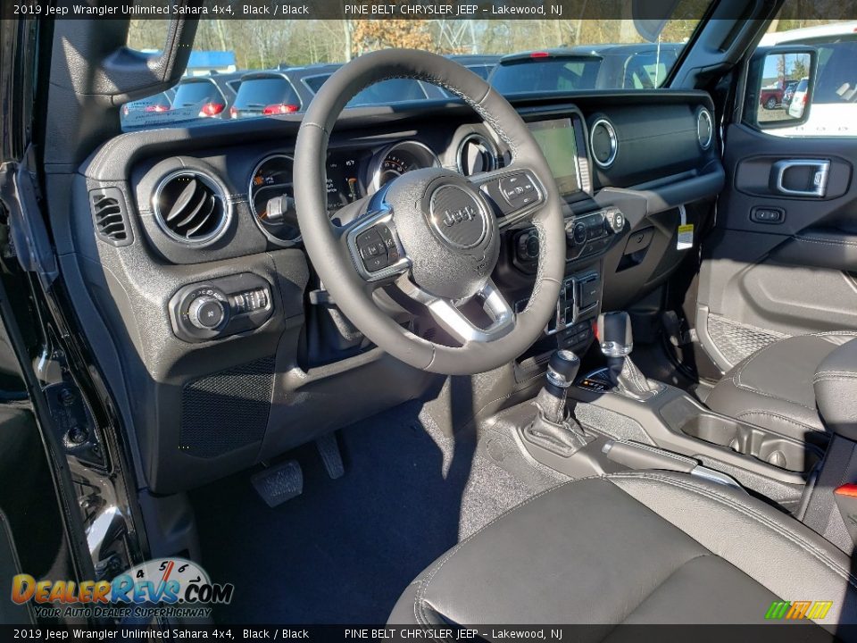 Front Seat of 2019 Jeep Wrangler Unlimited Sahara 4x4 Photo #7