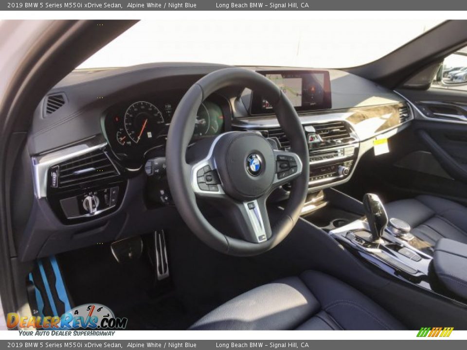 Dashboard of 2019 BMW 5 Series M550i xDrive Sedan Photo #5