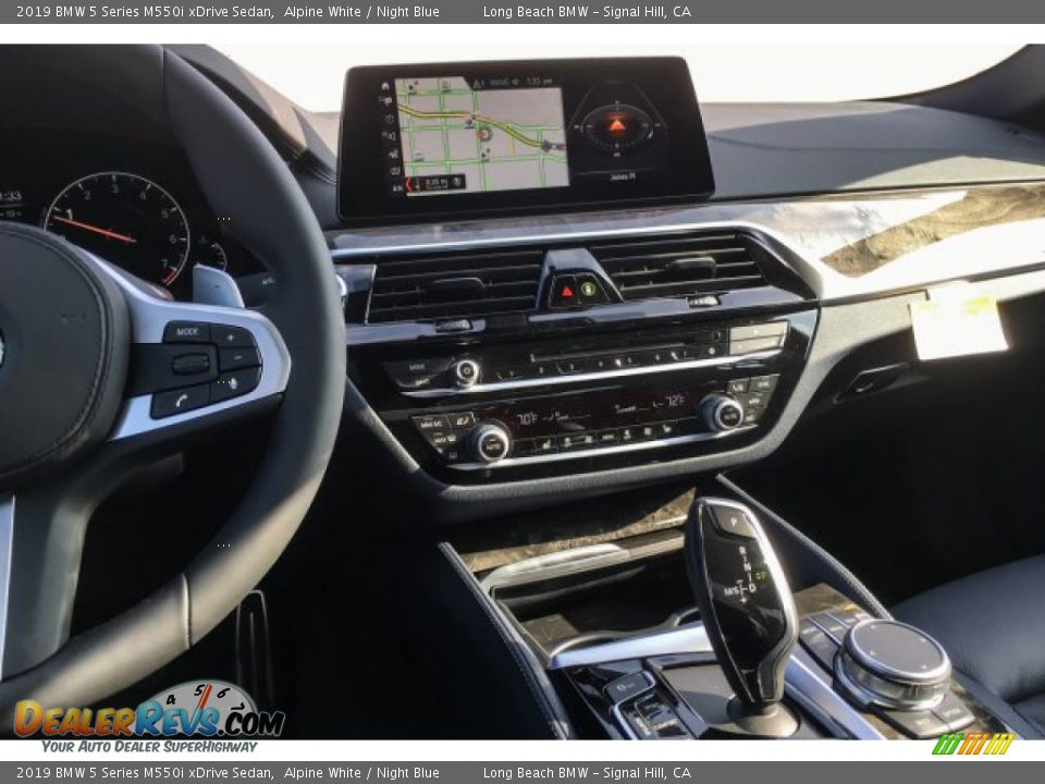 Controls of 2019 BMW 5 Series M550i xDrive Sedan Photo #6