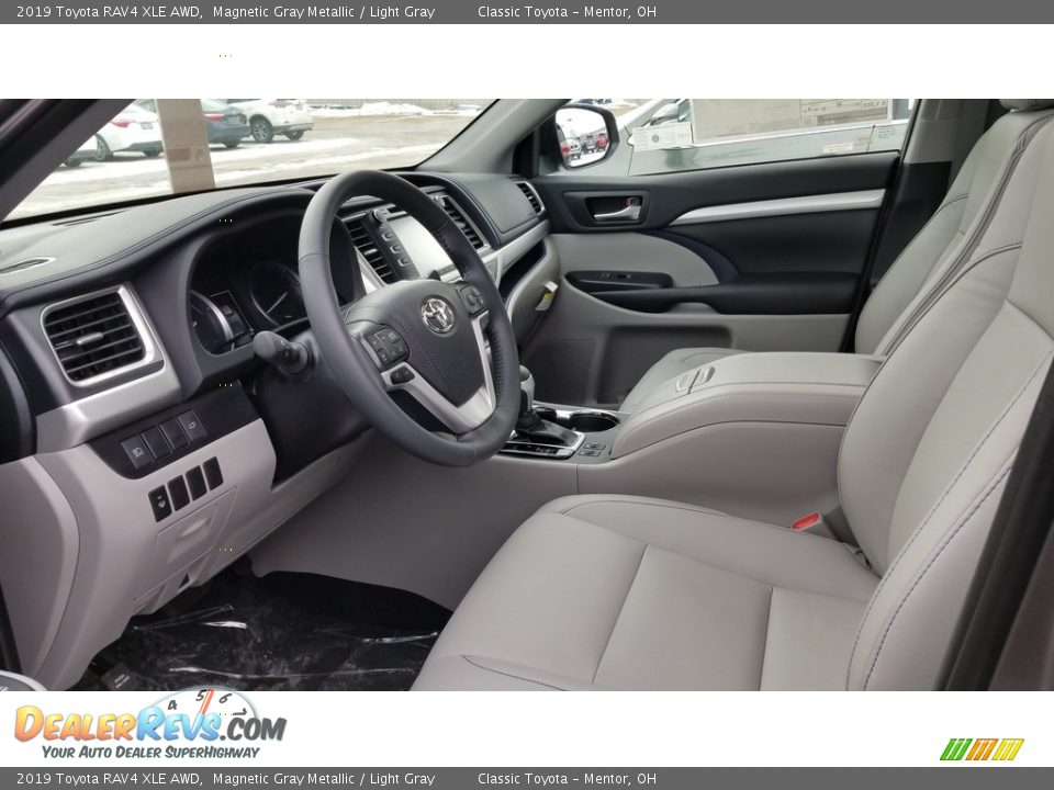 Front Seat of 2019 Toyota RAV4 XLE AWD Photo #2