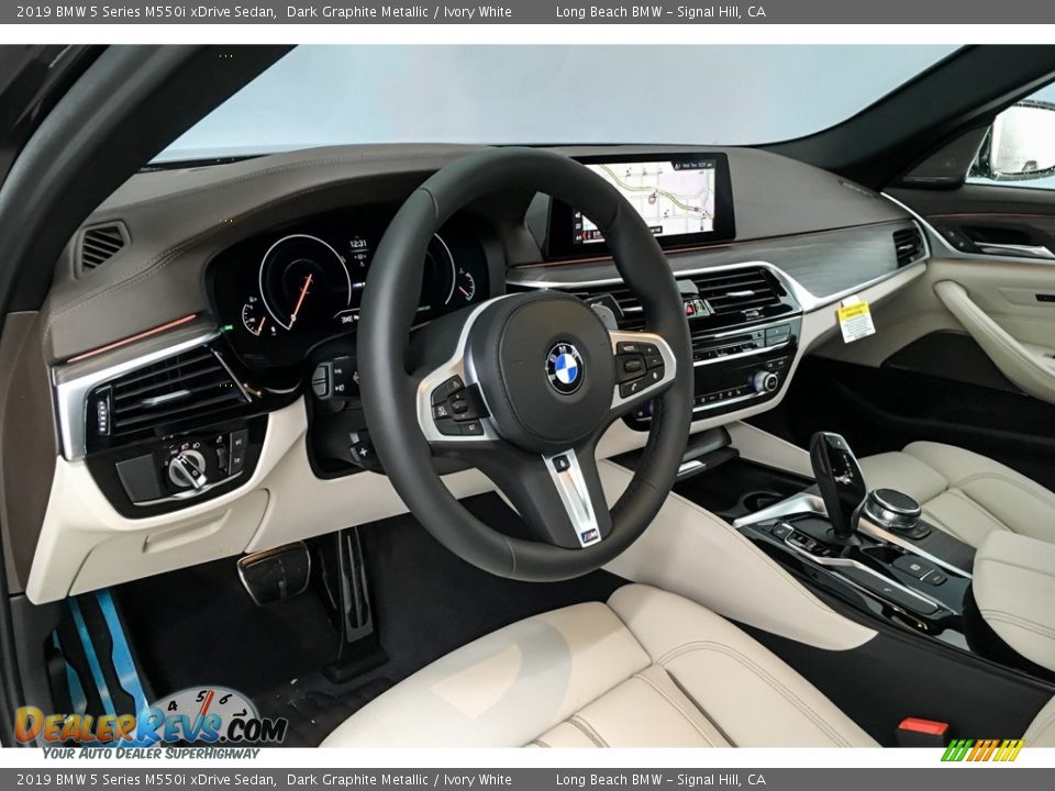 Dashboard of 2019 BMW 5 Series M550i xDrive Sedan Photo #4