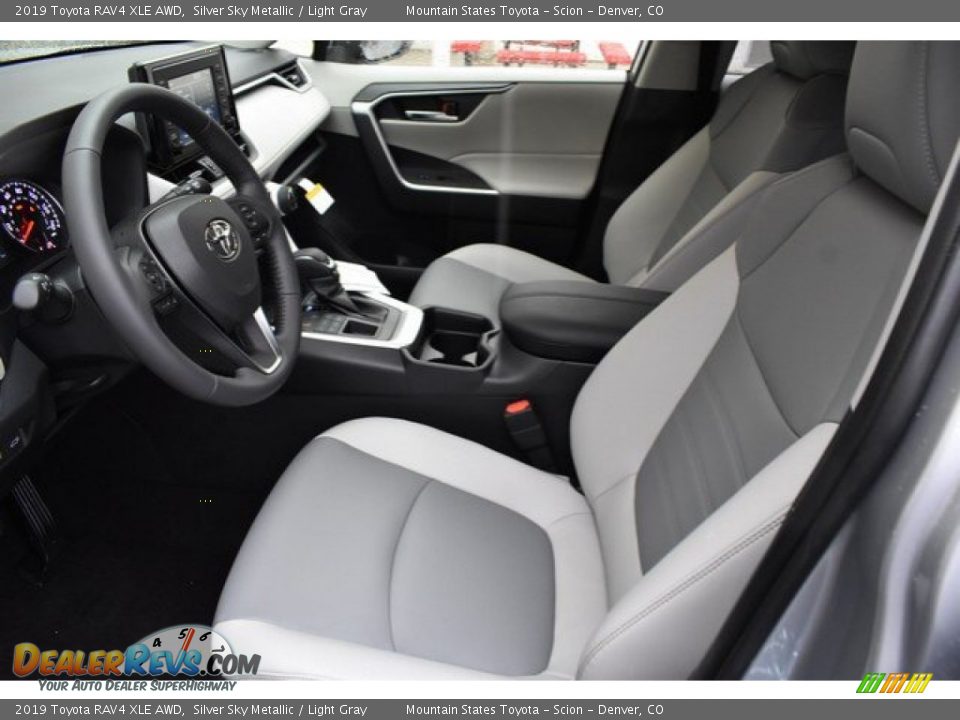 Front Seat of 2019 Toyota RAV4 XLE AWD Photo #6