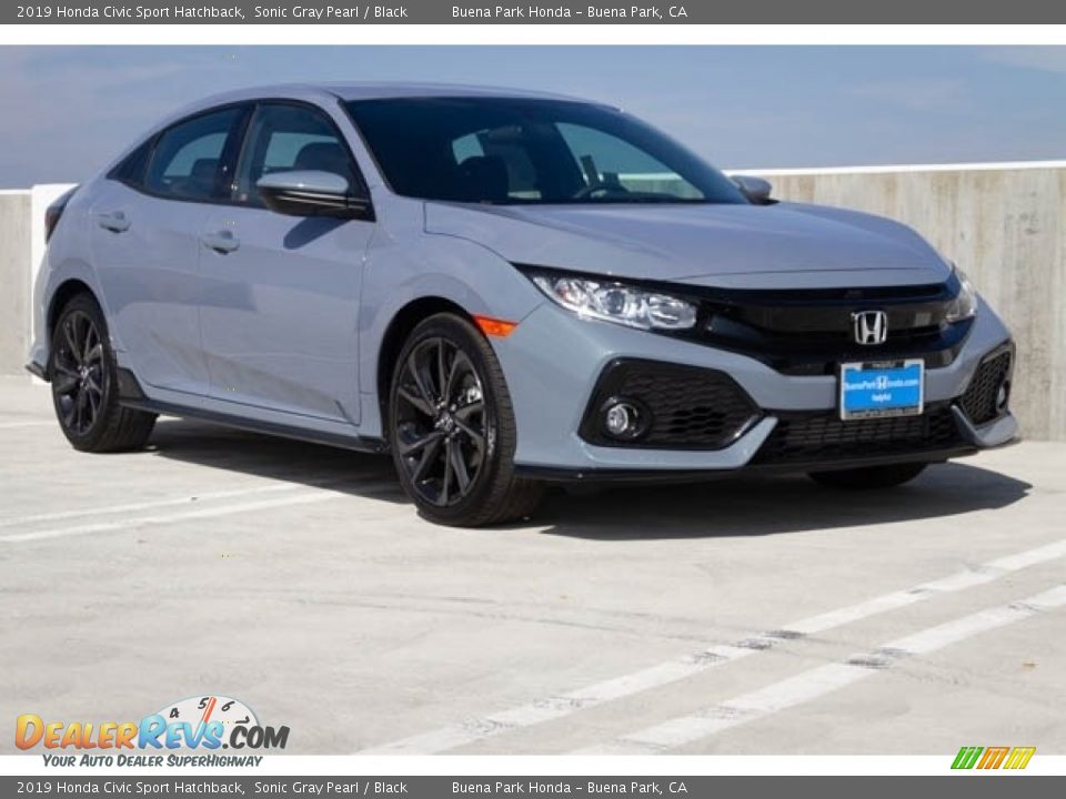 Front 3/4 View of 2019 Honda Civic Sport Hatchback Photo #1