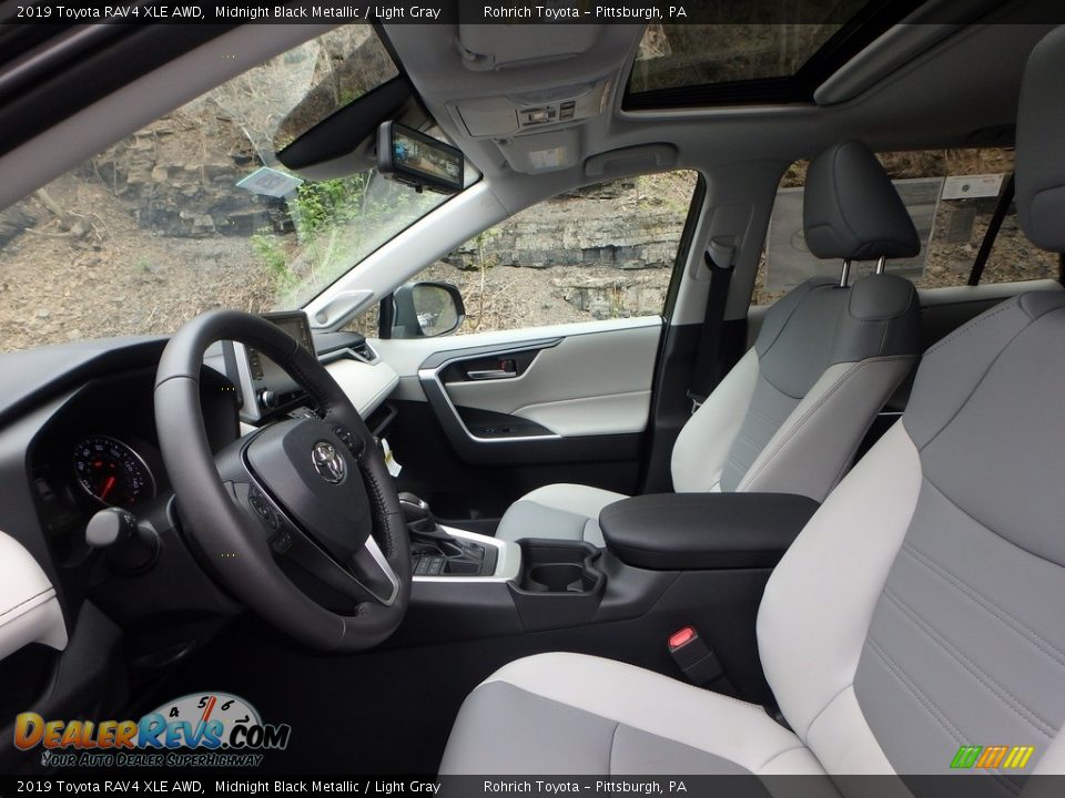 Front Seat of 2019 Toyota RAV4 XLE AWD Photo #6