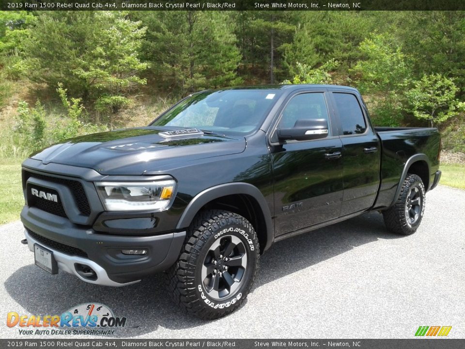Front 3/4 View of 2019 Ram 1500 Rebel Quad Cab 4x4 Photo #2