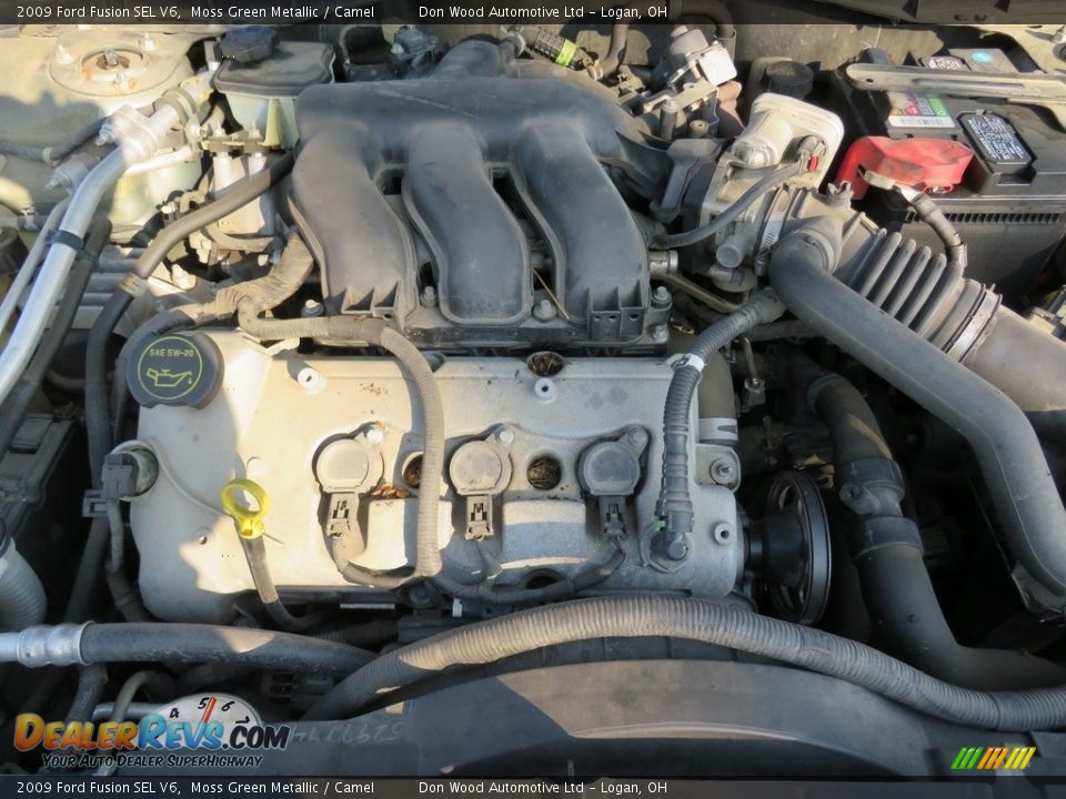 2009 Ford Fusion SEL V6 Moss Green Metallic / Camel Photo #7