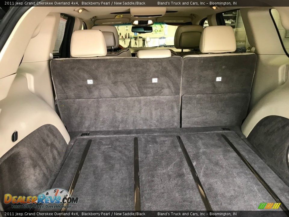 2011 Jeep Grand Cherokee Overland 4x4 Blackberry Pearl / New Saddle/Black Photo #34