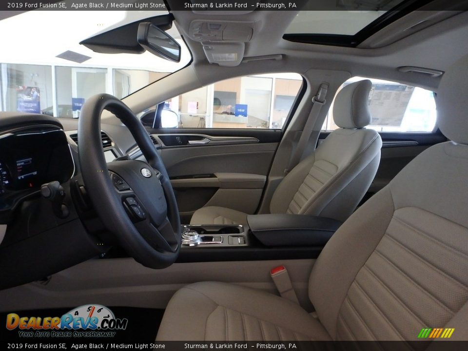 2019 Ford Fusion SE Agate Black / Medium Light Stone Photo #7