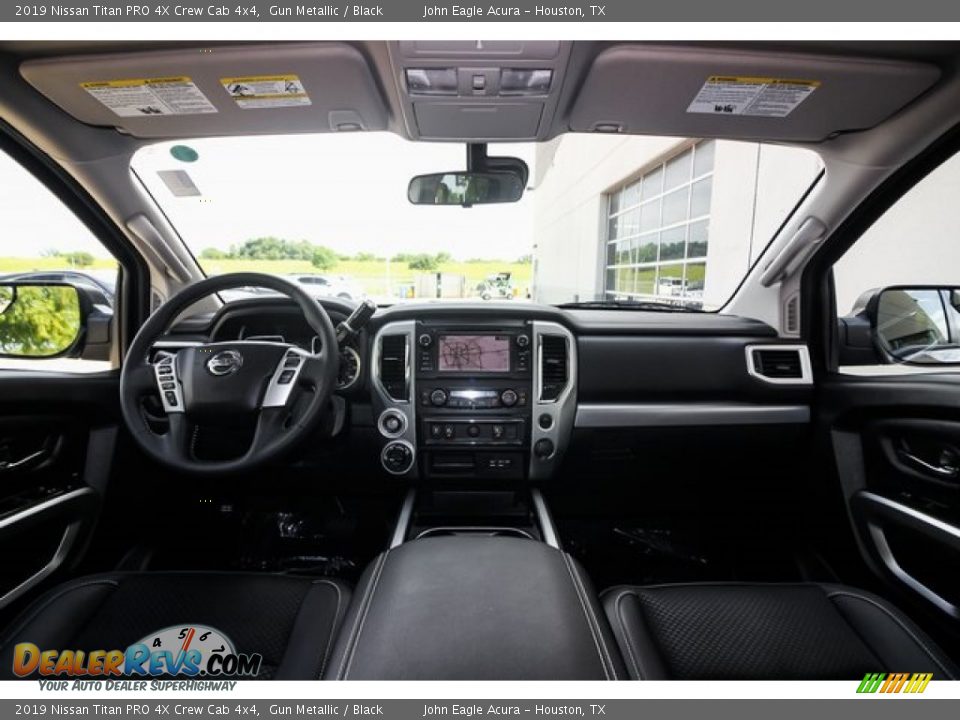 Dashboard of 2019 Nissan Titan PRO 4X Crew Cab 4x4 Photo #9